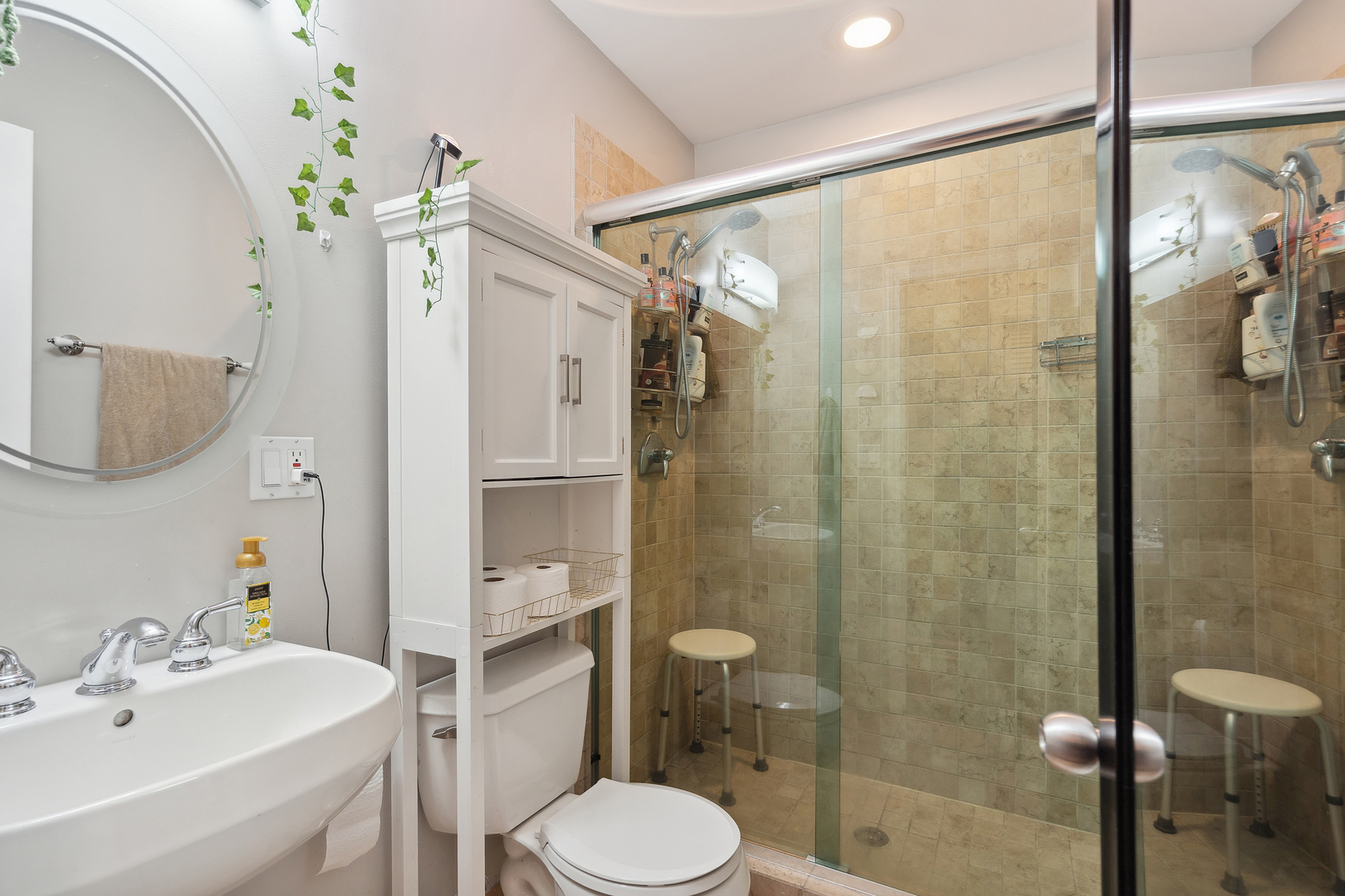 531 North Racine Avenue, Unit 3 Chicago, IL 60642 - Photo 17 of 22 a bathroom with a sink toilet and shower