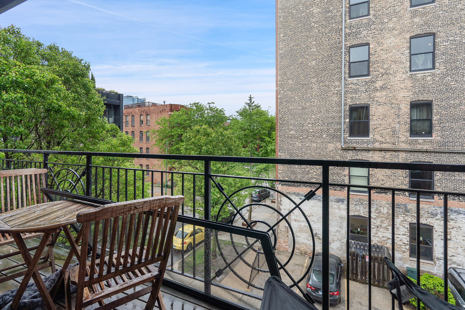 531 North Racine Avenue, Unit 3 Chicago, IL 60642 - Photo 18 of 22 a view of a balcony with furniture