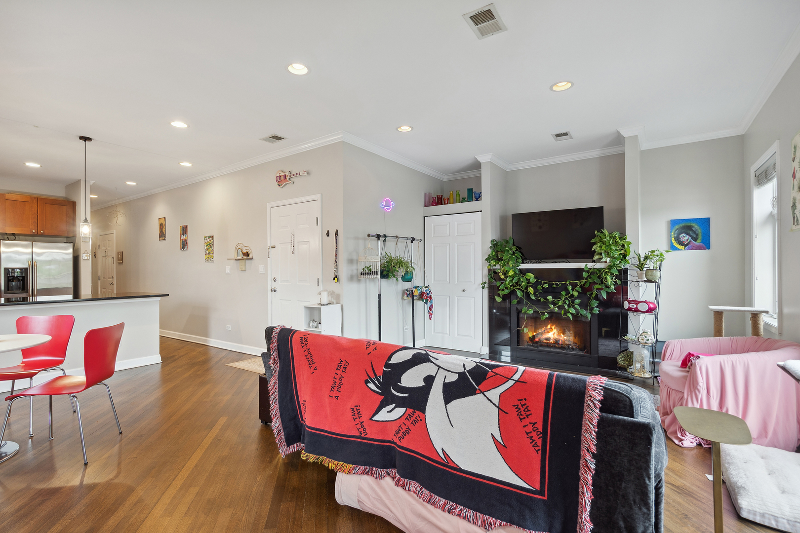 531 North Racine Avenue, Unit 3 Chicago, IL 60642 - Photo 7 of 22 a living room with furniture and a flat screen tv