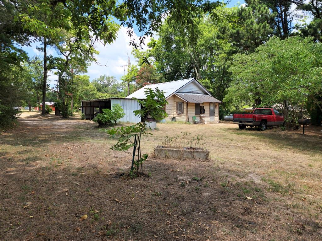 2110 Fm 275 Emory, TX 75440 - Photo 7 of 14 a house with a yard and parking space