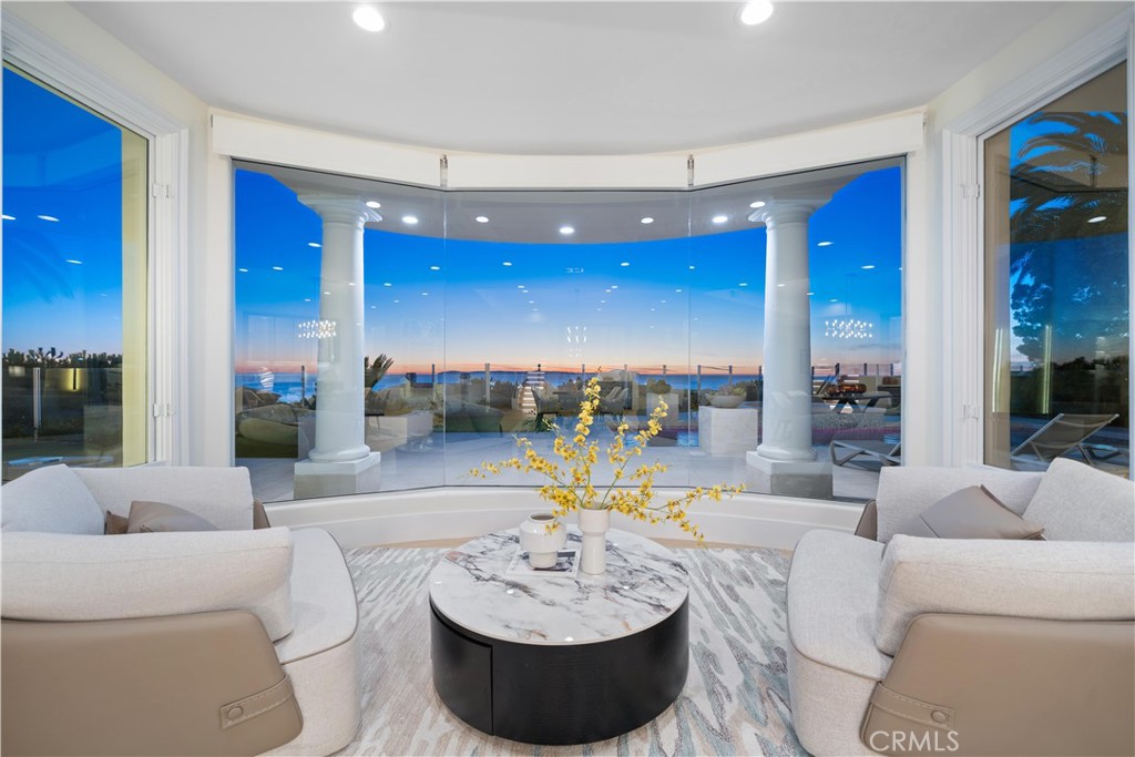 9 Seashell Newport Coast, CA 92657 - Photo 18 of 45 a living room with furniture and a large window