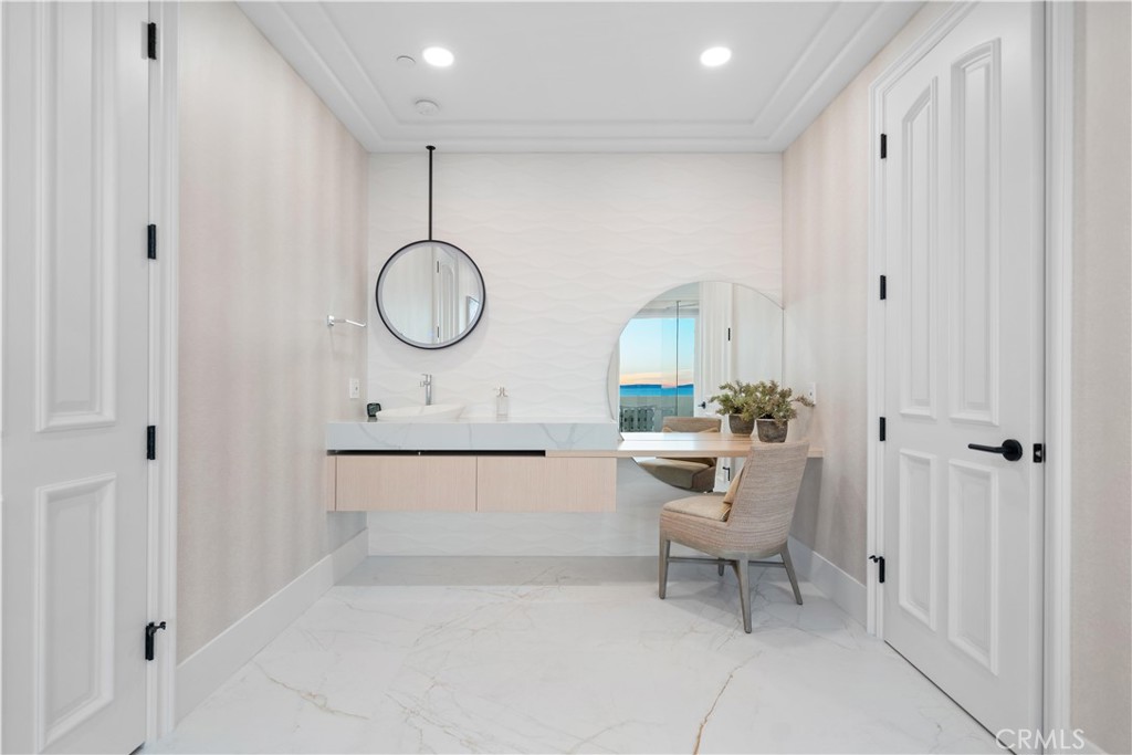 9 Seashell Newport Coast, CA 92657 - Photo 23 of 45 a living room with a sink furniture and a window