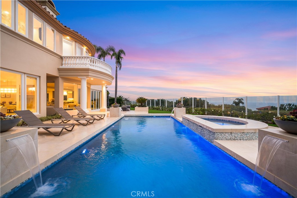 9 Seashell Newport Coast, CA 92657 - Photo 32 of 45 a view of a house with swimming pool and sitting area