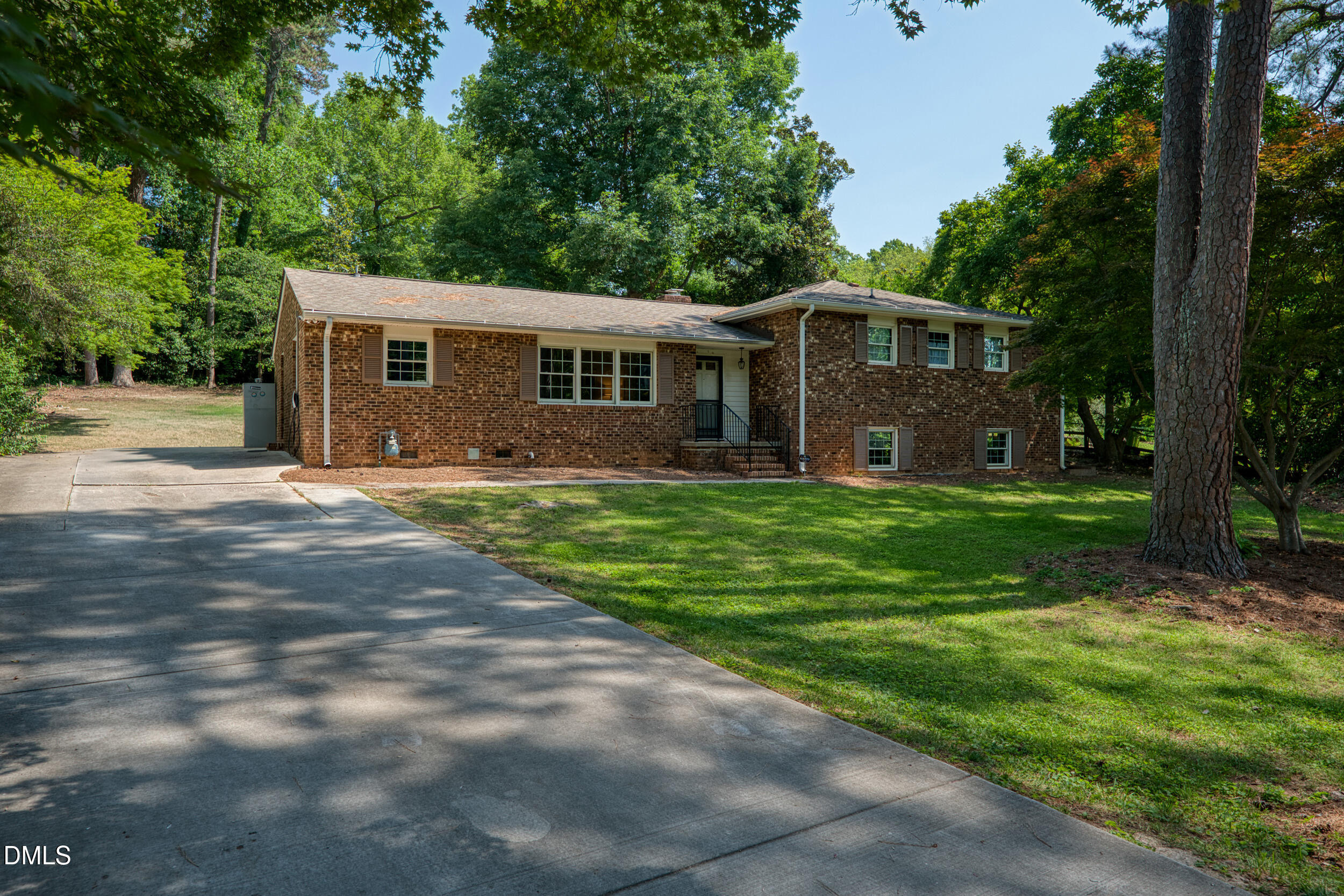 3726 Swift Drive Raleigh, NC 27606 - Photo 2 of 40 a front view of a house with yard