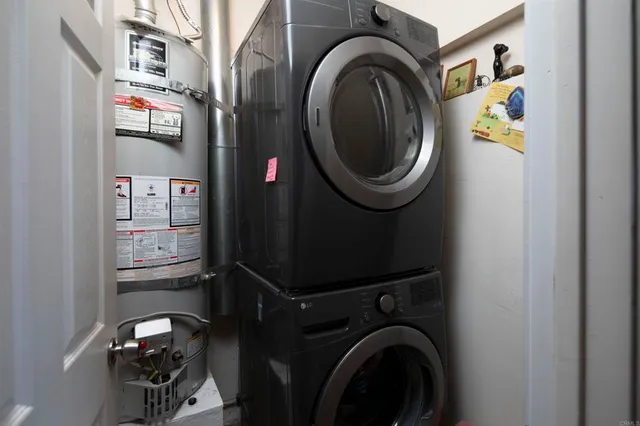 swimming pool view with a seating space