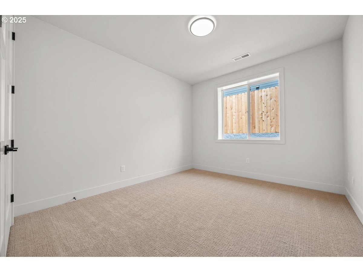 16705 Northeast 38th Avenue Vancouver, WA 98686 - Photo 30 of 45 an empty room with windows