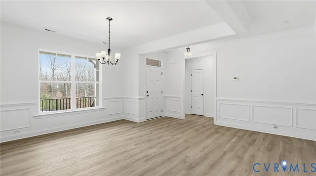 a kitchen with a sink stove and refrigerator