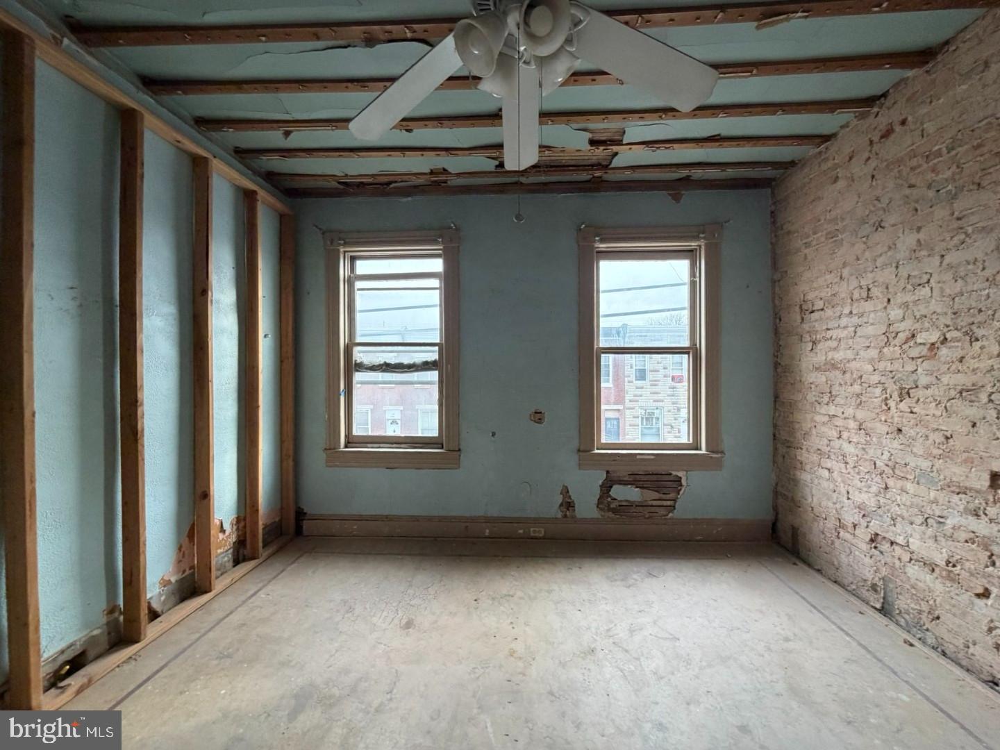 12 South Kresson Street Baltimore, MD 21224 - Photo 15 of 29 wooden floor and window in an empty room