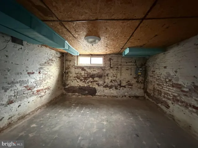 a view of a house with large windows