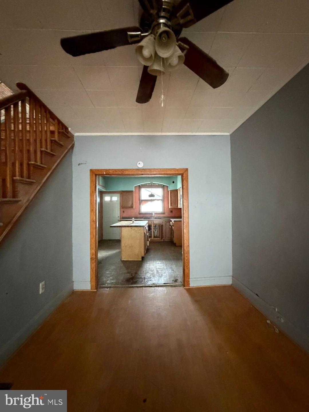 12 South Kresson Street Baltimore, MD 21224 - Photo 6 of 29 a view of a room with a ceiling fan