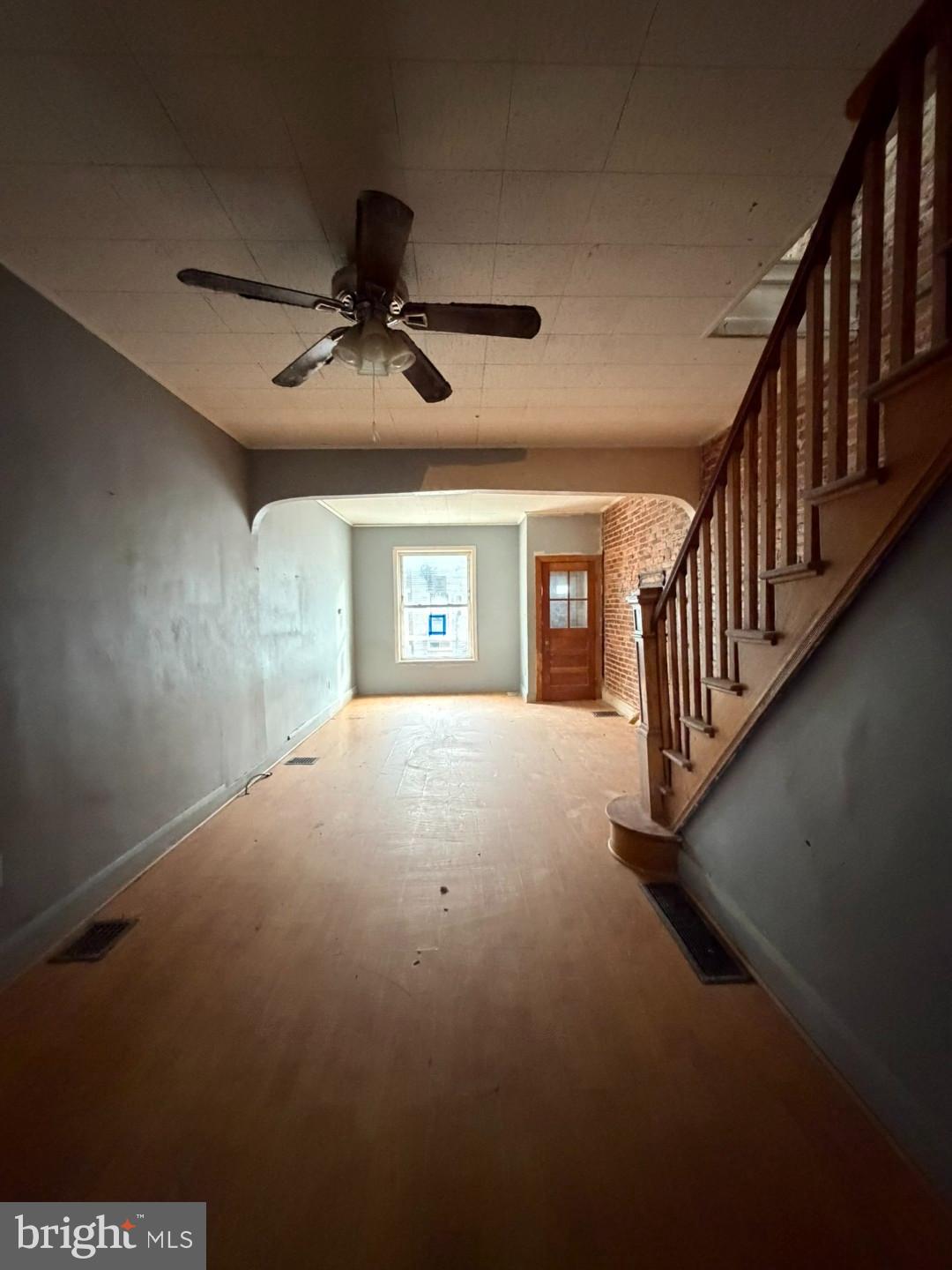 12 South Kresson Street Baltimore, MD 21224 - Photo 7 of 29 a view of an empty room with a window