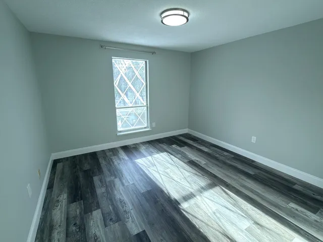 a bathroom with a sink toilet and vanity