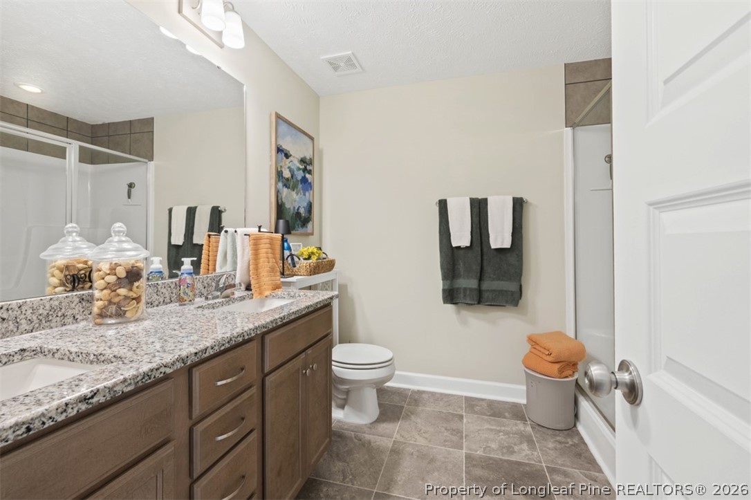 5512 Tolarsville Road St. Pauls, NC 28384 - Photo 13 of 21 En-Suite Bathroom