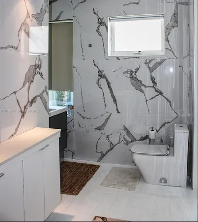 a room that has a table and chair in it