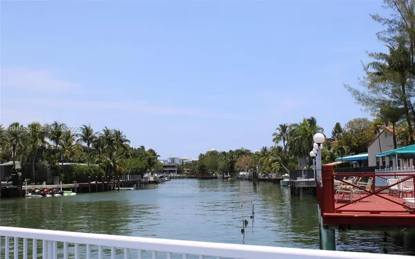 a view of a lake with trees