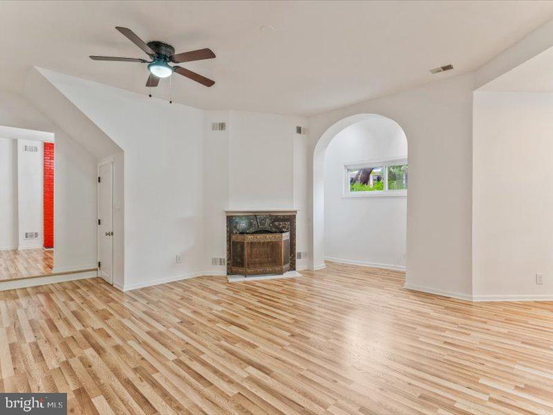 1200 D Street Northeast Washington, DC 20002 - Photo 18 of 47 Spacious living area with elegant charm.