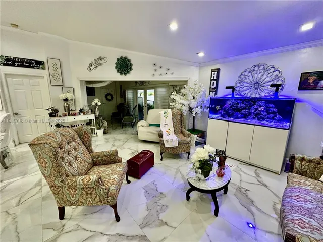 a living room with furniture and rug