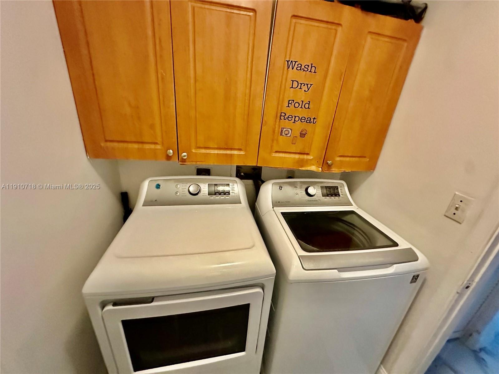 5259 Northwest 184th Lane Miami Gardens, FL 33055 - Photo 19 of 32 a utility room with dryer and washer