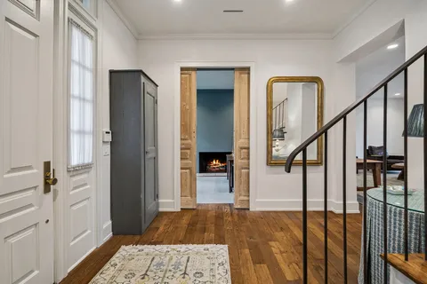 a room with furniture and a fireplace