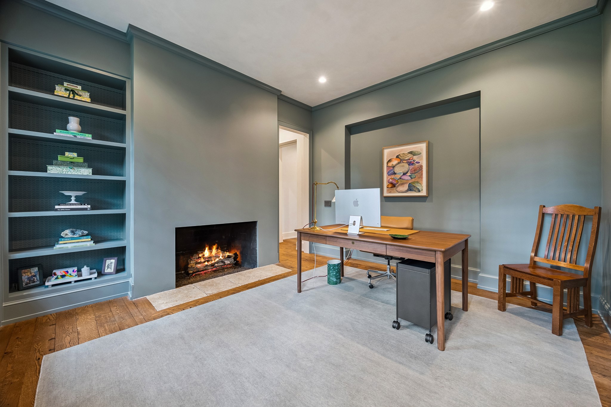 448 Blalock Road Houston, TX 77024 - Photo 20 of 49 a room with furniture and a fireplace