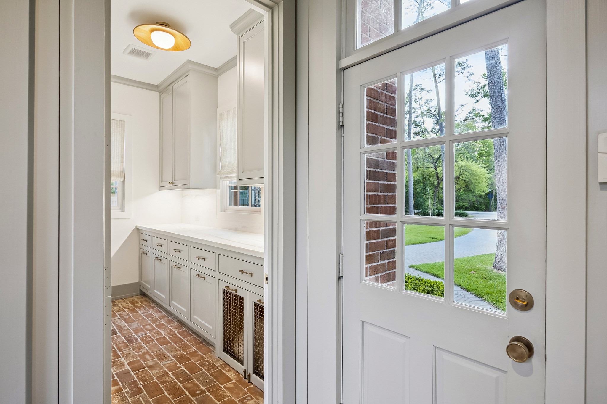 448 Blalock Road Houston, TX 77024 - Photo 29 of 49 a bathroom with a tub and a window