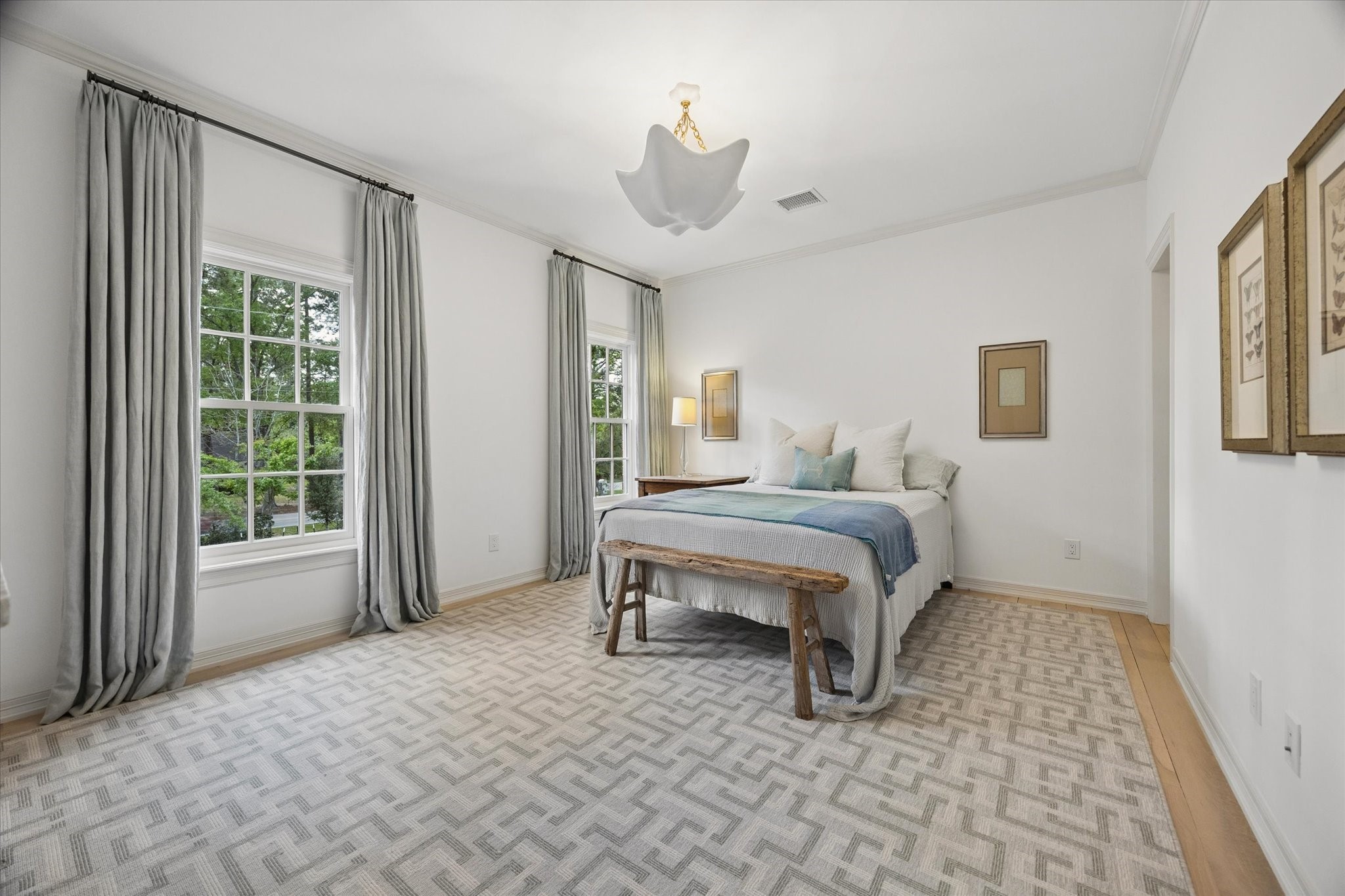 448 Blalock Road Houston, TX 77024 - Photo 32 of 49 a spacious bedroom with a bed and a window