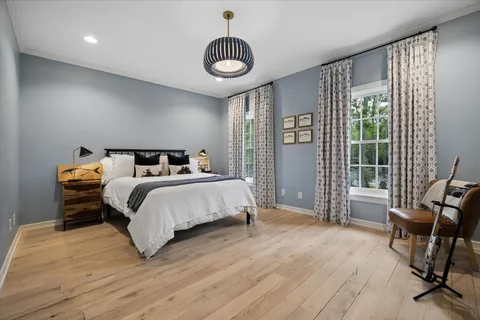a bathroom with a sink a mirror and shower