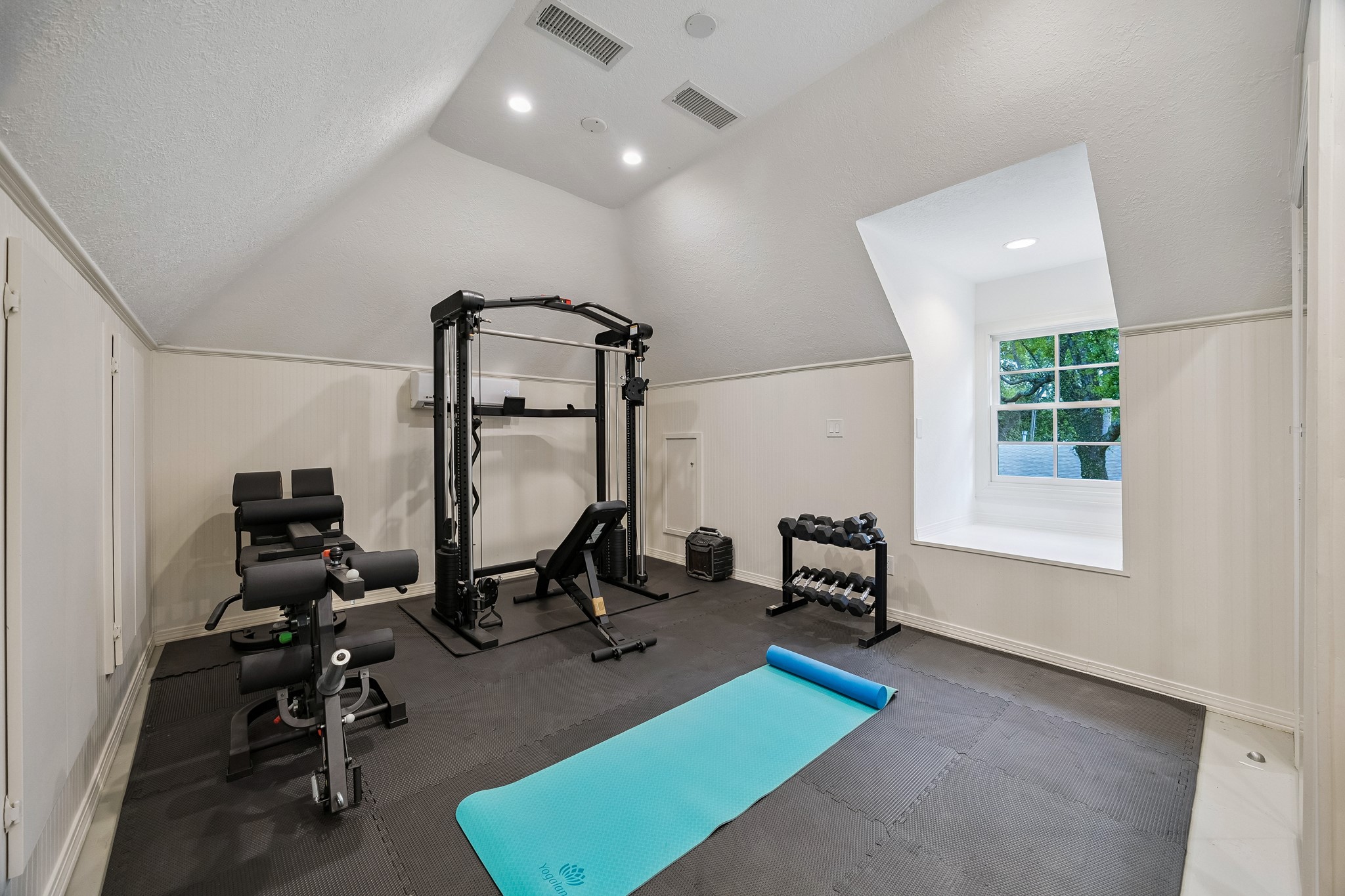 448 Blalock Road Houston, TX 77024 - Photo 39 of 49 a view of a room with gym equipment