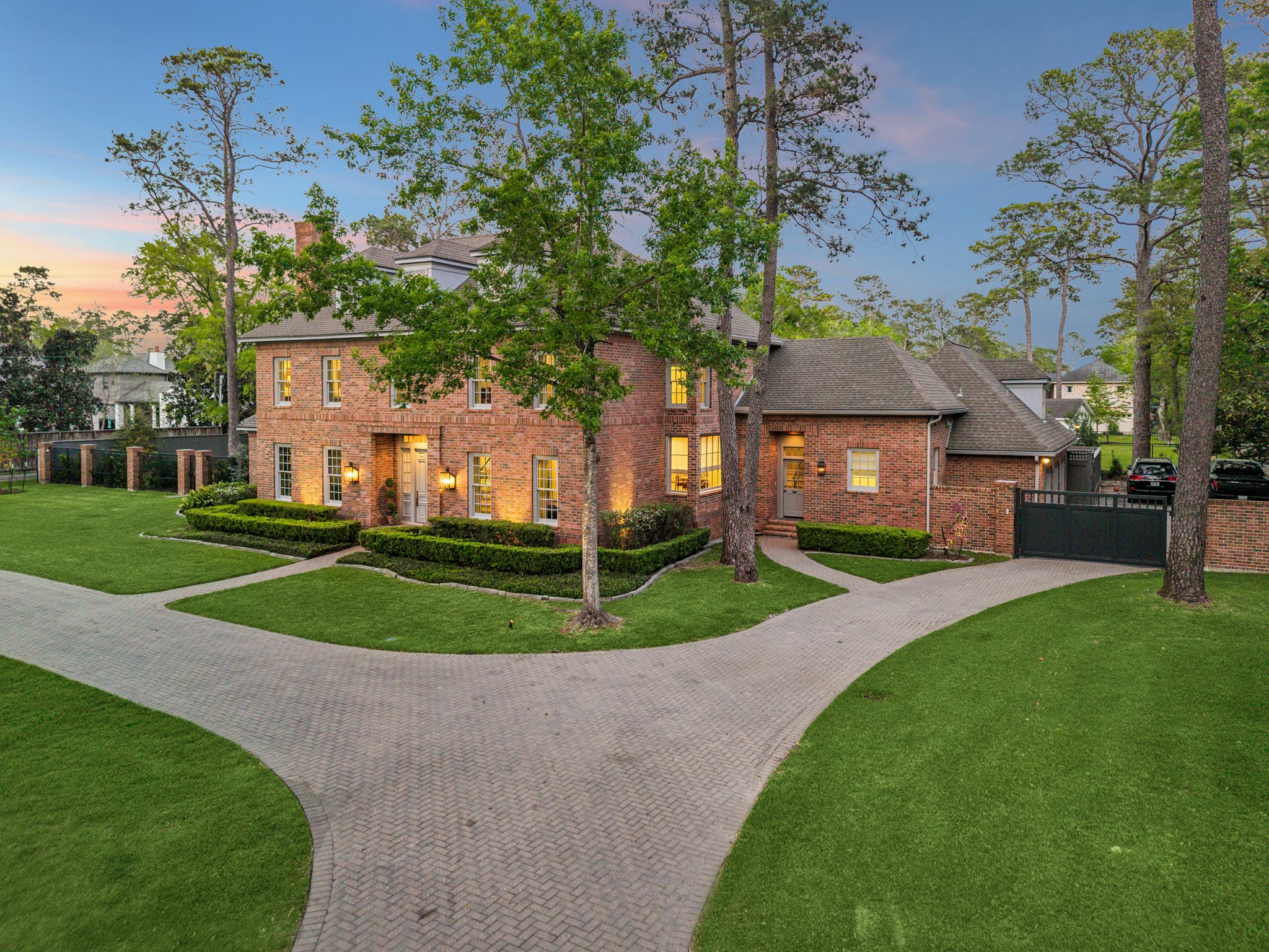 448 Blalock Road Houston, TX 77024 - Photo 47 of 49 a front view of a house with a yard and garage