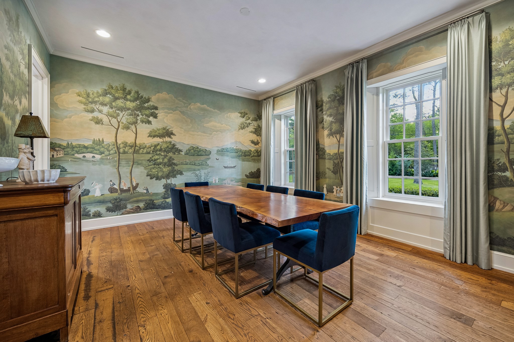 448 Blalock Road Houston, TX 77024 - Photo 5 of 49 a dining room with wooden floor glass table and chairs
