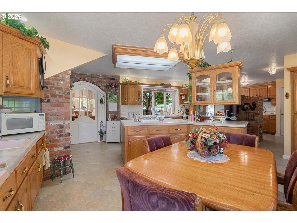 1300 Fair Oaks Road Oakland, OR 97462 - Photo 19 of 48 a dining room with a table and chairs