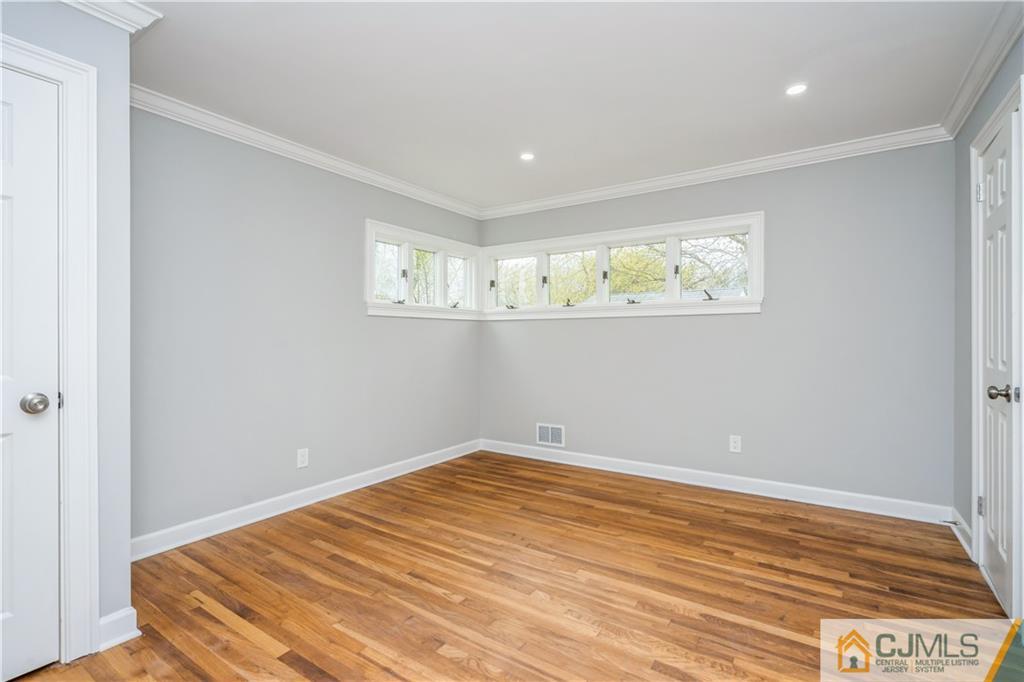 36 Princeton Road Old Bridge, NJ 08859 - Photo 11 of 19 a view of a room with wooden floor and window
