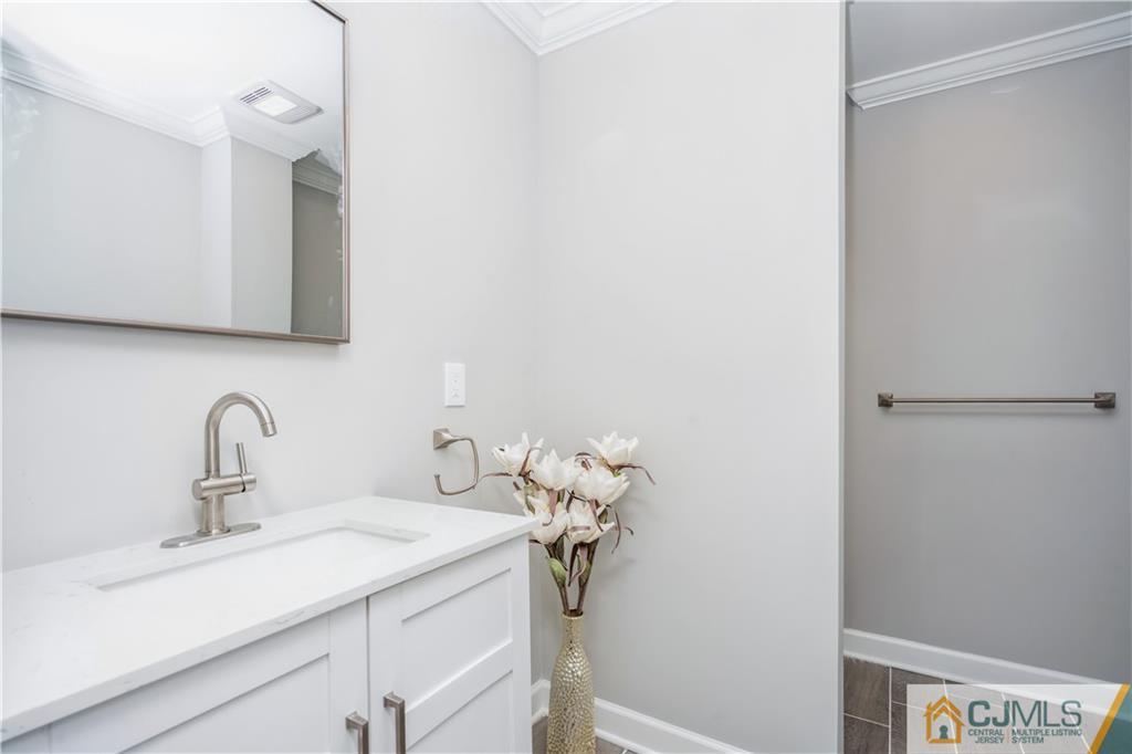 36 Princeton Road Old Bridge, NJ 08859 - Photo 12 of 19 a bathroom with a sink and a mirror