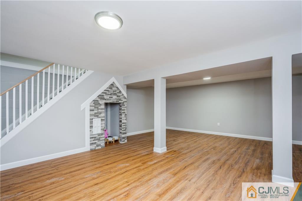 36 Princeton Road Old Bridge, NJ 08859 - Photo 16 of 19 a view of empty room with wooden floor