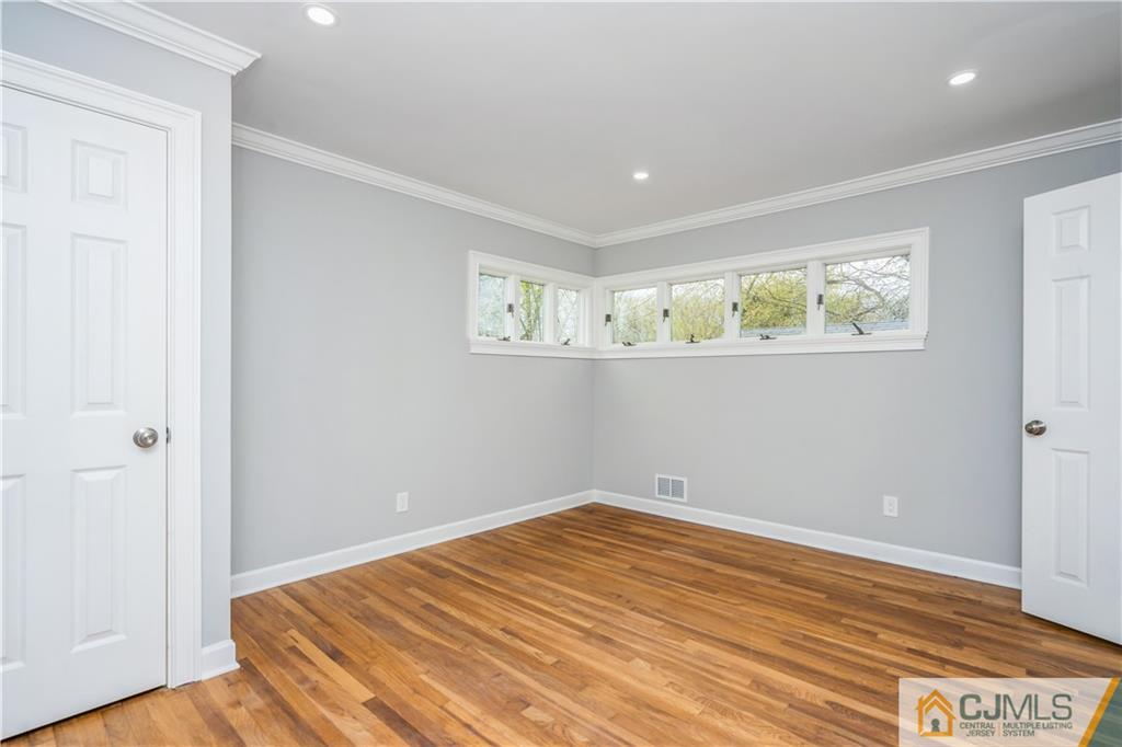 36 Princeton Road Old Bridge, NJ 08859 - Photo 10 of 19 a view of room with wooden floor and window