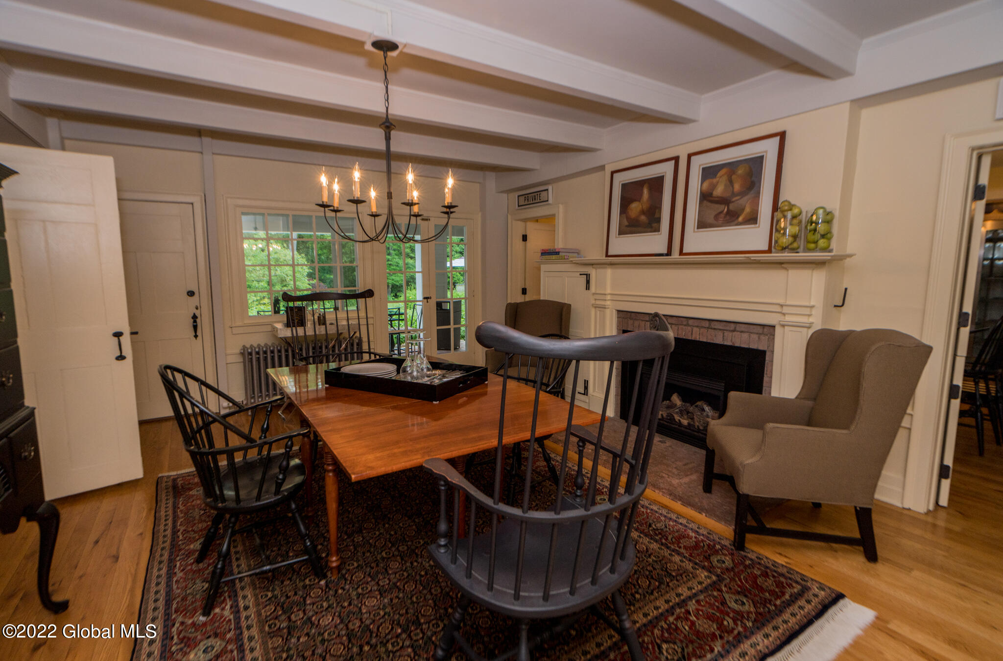 667 Ridge Road Queensbury, NY 12804 - Photo 17 of 66 Formal dining room with gas fireplace