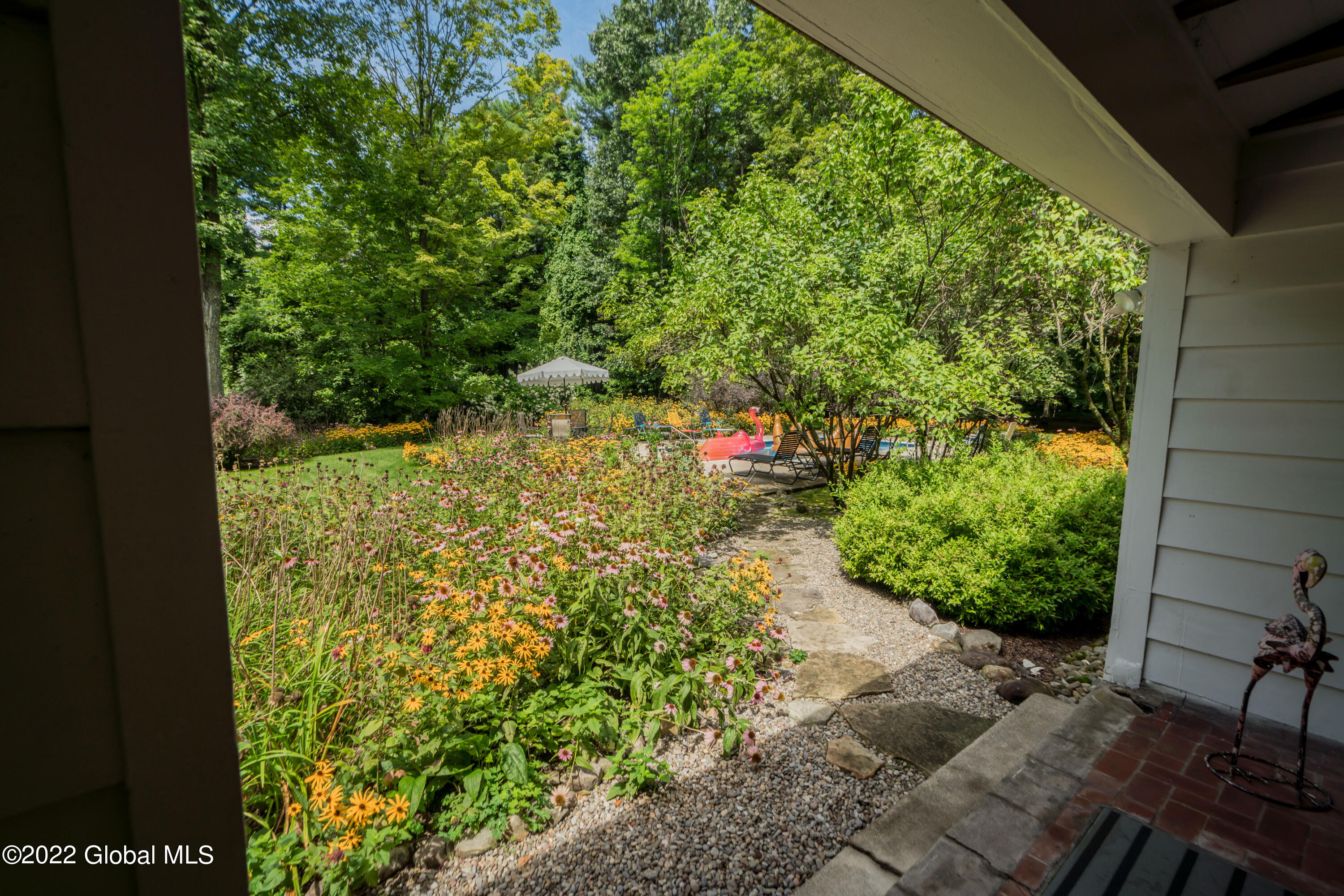 667 Ridge Road Queensbury, NY 12804 - Photo 29 of 66 Garden path to pool