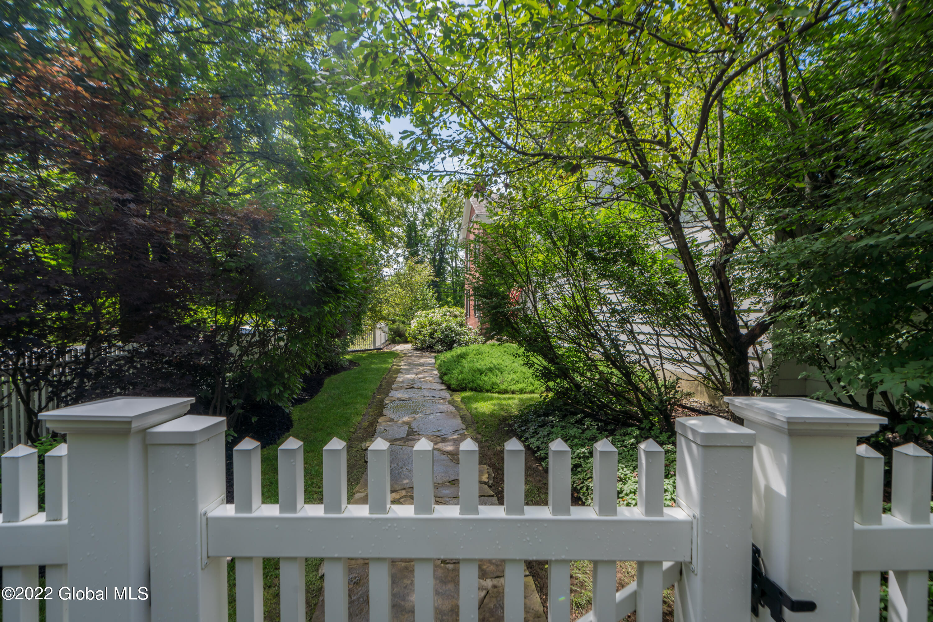 667 Ridge Road Queensbury, NY 12804 - Photo 8 of 66 Gate leading to entry path