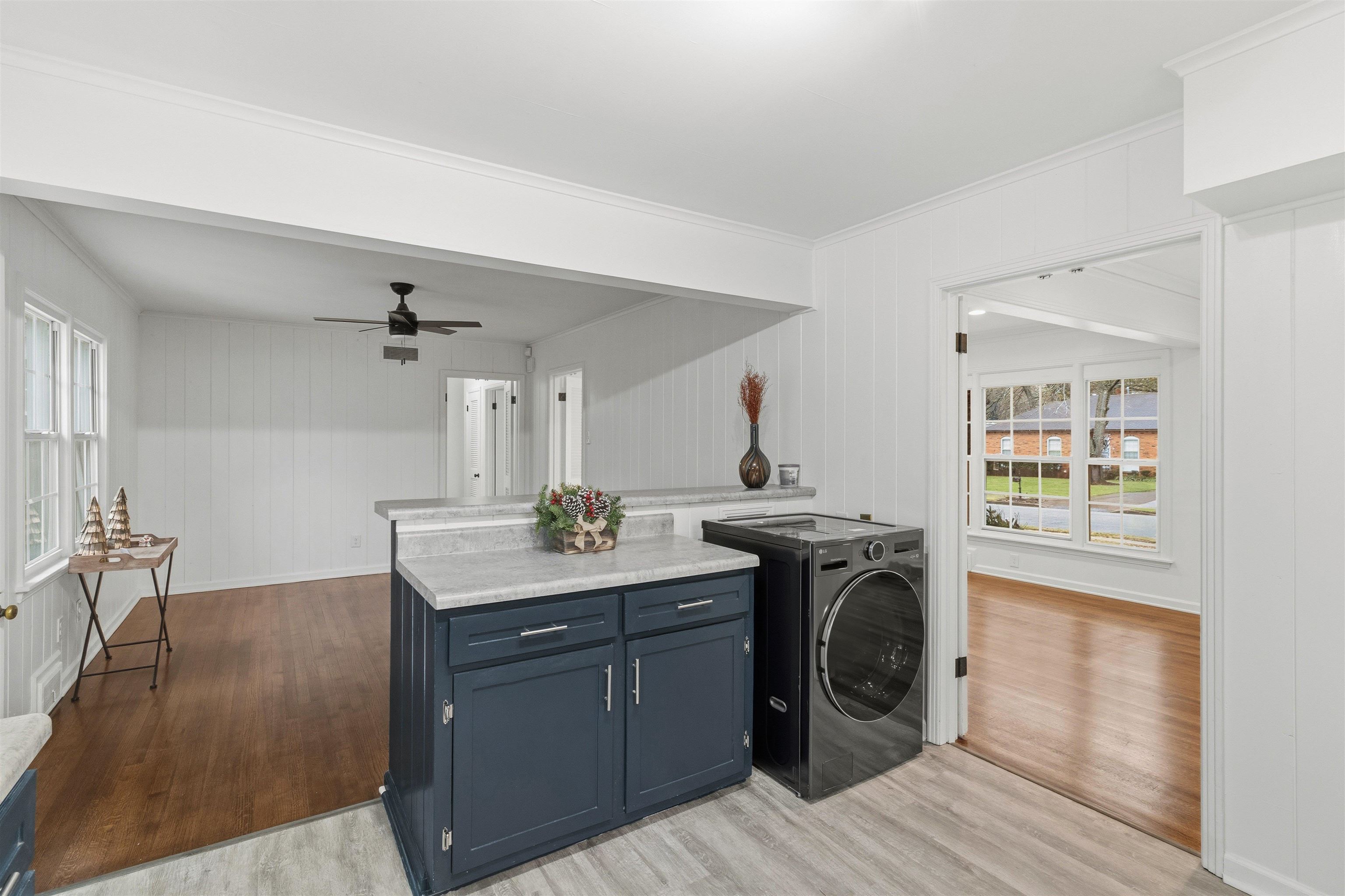 416 Rosser Road Memphis, TN 38120 - Photo 11 of 30 a view of a kitchen counter space and wooden floor