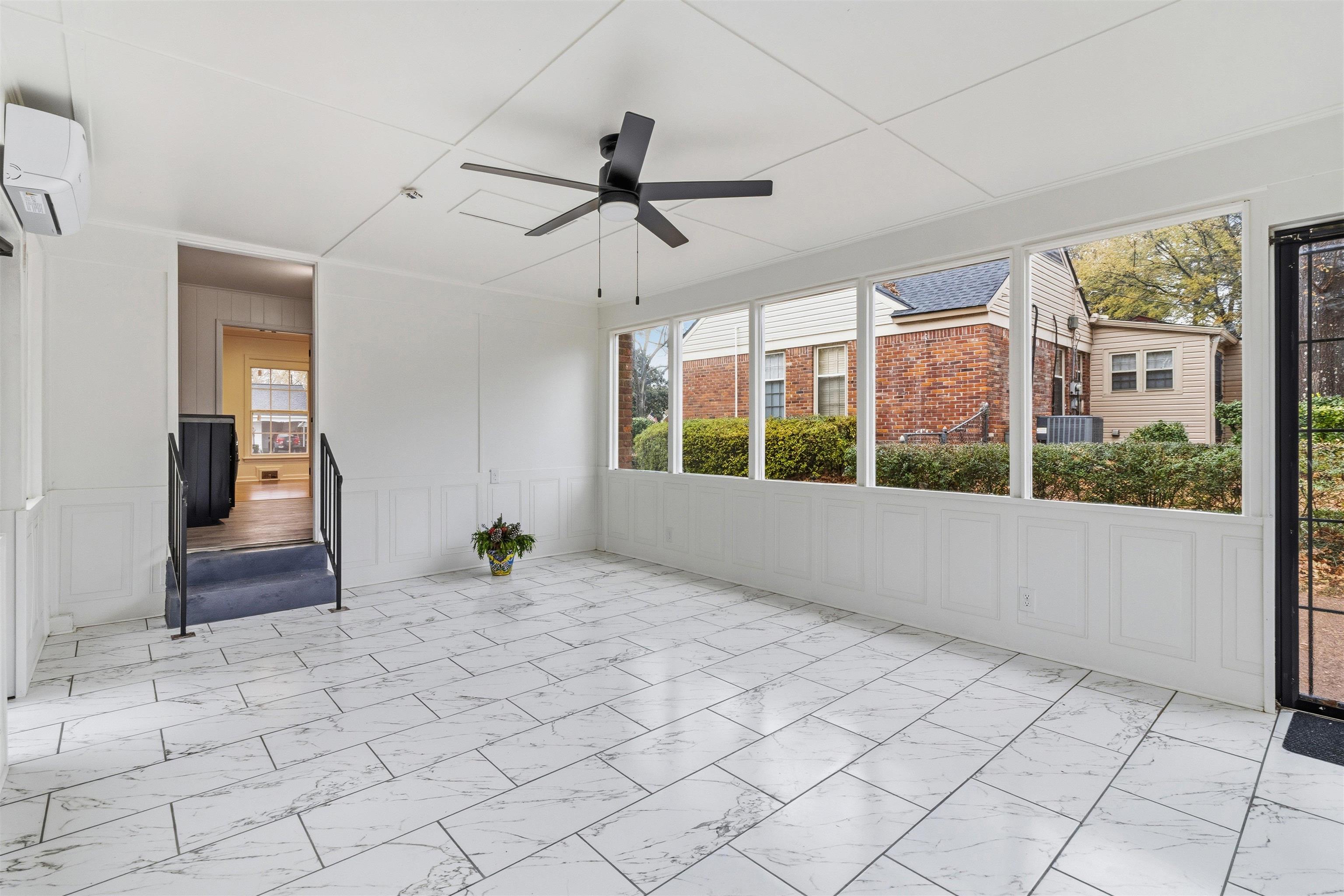 416 Rosser Road Memphis, TN 38120 - Photo 14 of 30 a view of an empty room with a window