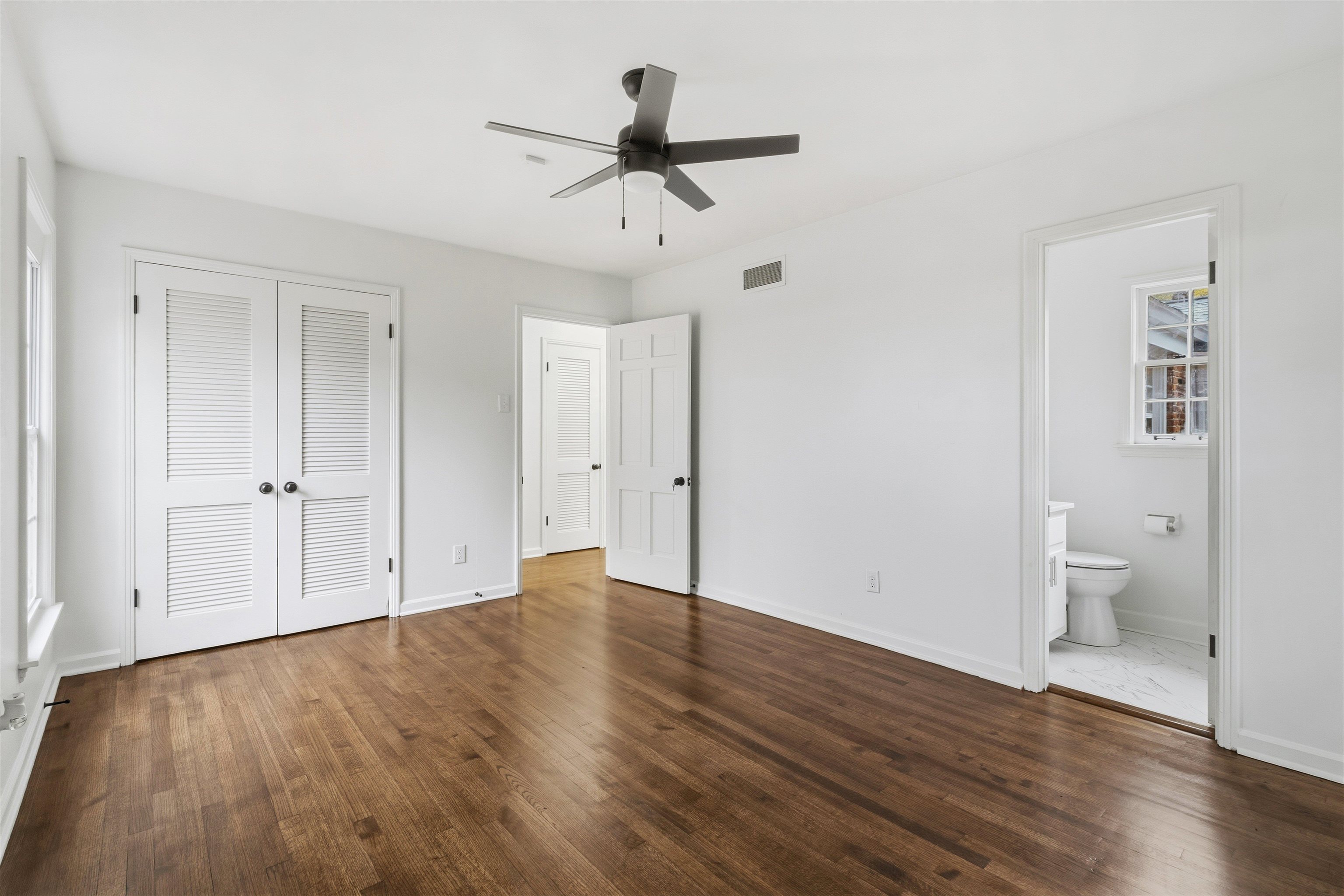 416 Rosser Road Memphis, TN 38120 - Photo 17 of 30 wooden floor in an empty room with a window
