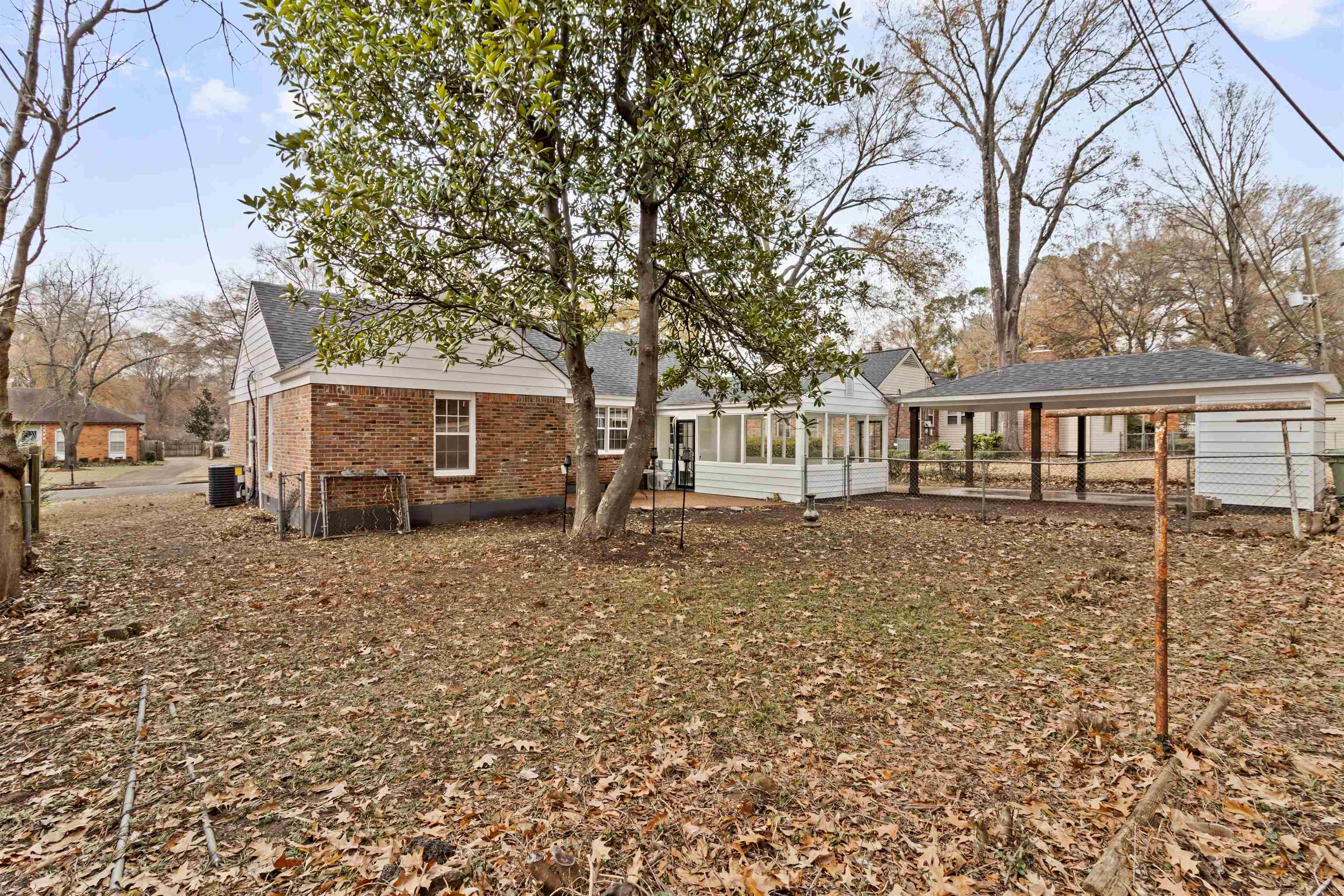416 Rosser Road Memphis, TN 38120 - Photo 28 of 30 a view of a house with a yard