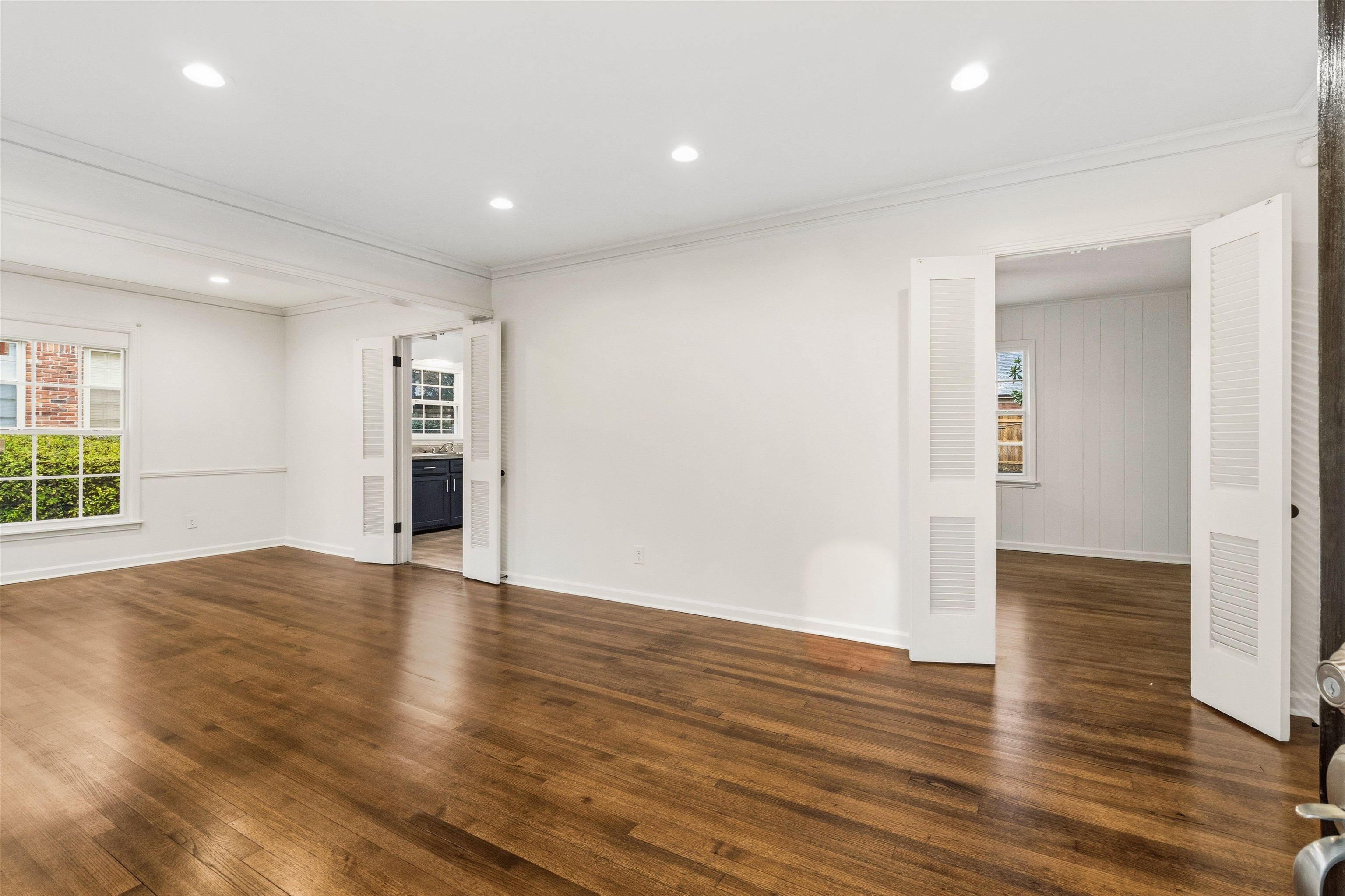 416 Rosser Road Memphis, TN 38120 - Photo 4 of 30 wooden floor in an empty room with a window