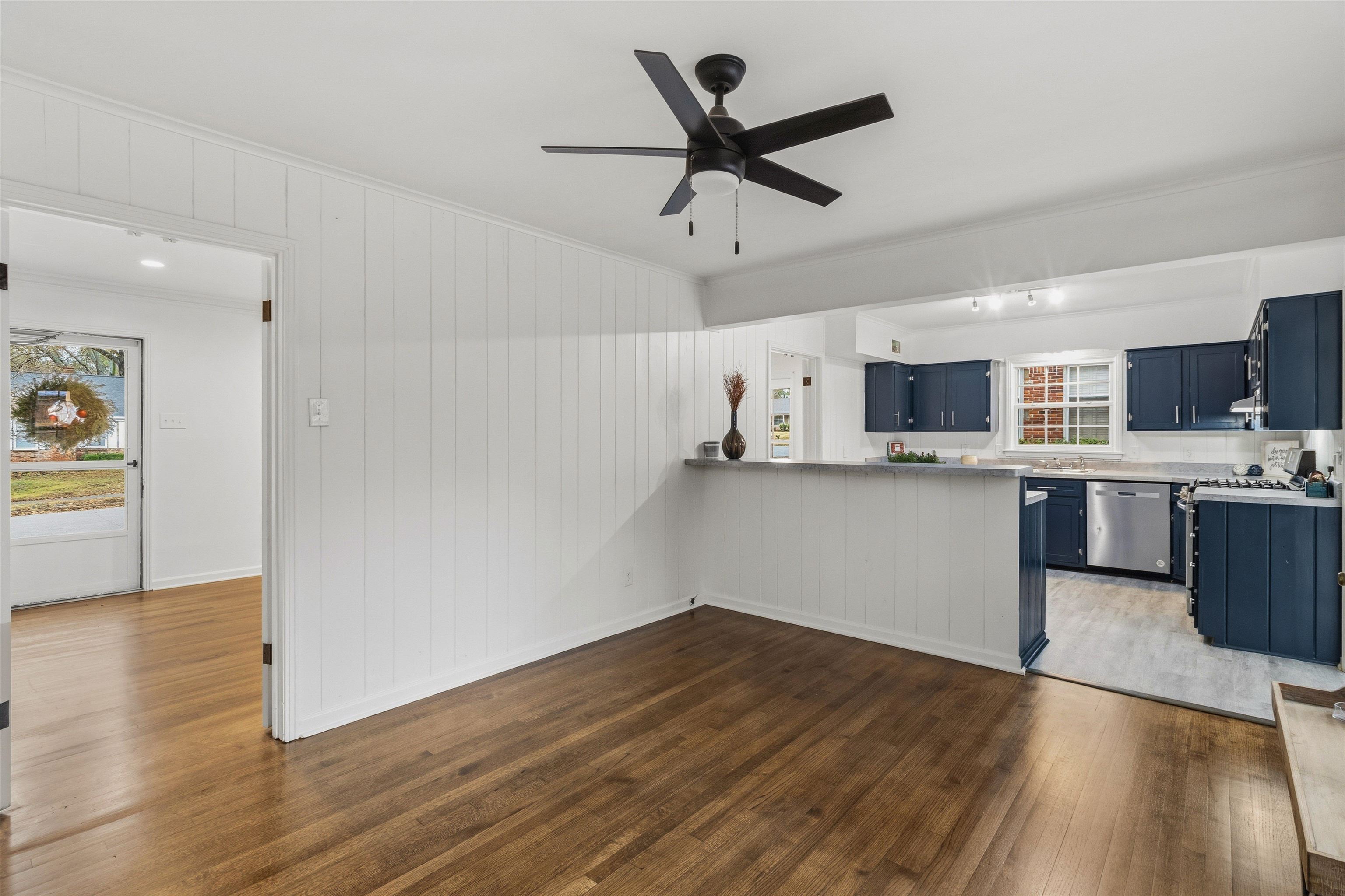 416 Rosser Road Memphis, TN 38120 - Photo 8 of 30 a view of kitchen with wooden floor and window