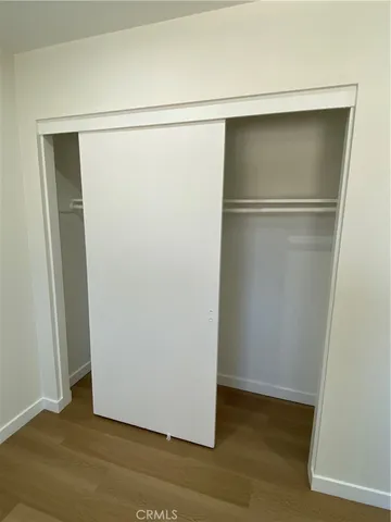 a view of small space with wooden floor