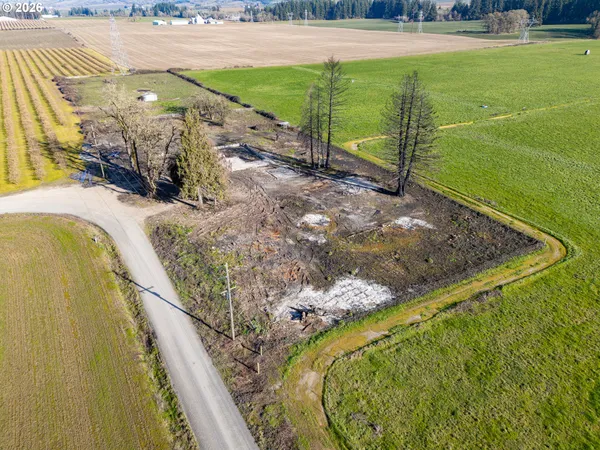 a view of a swimming pool with a yard