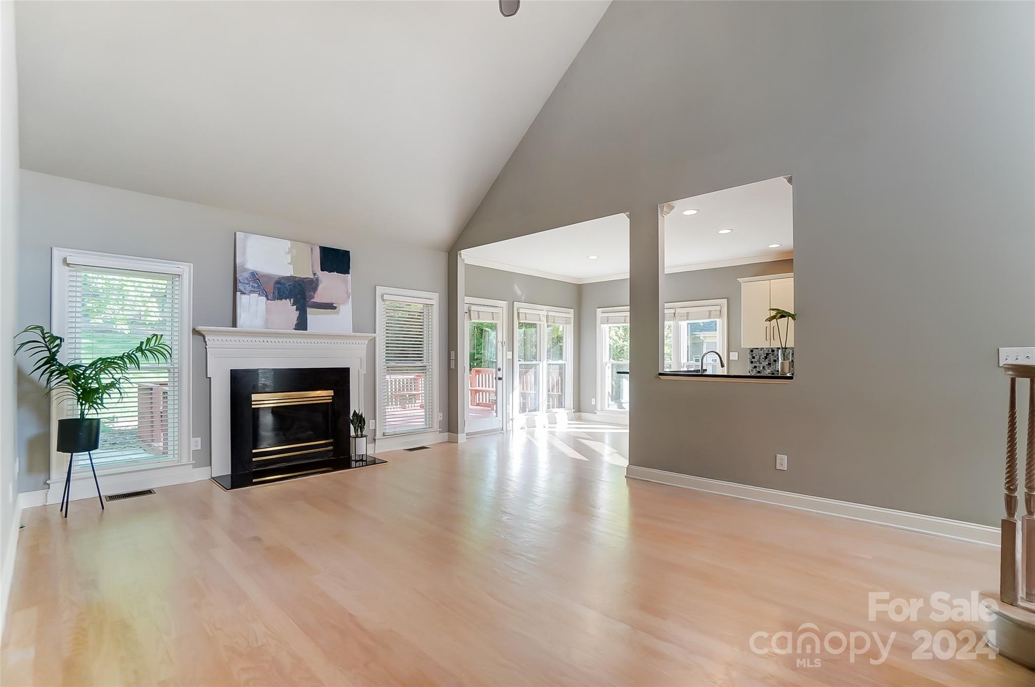 657 Portpatrick Place Fort Mill, SC 29708 - Photo 19 of 46 a view of a livingroom with a fireplace and window