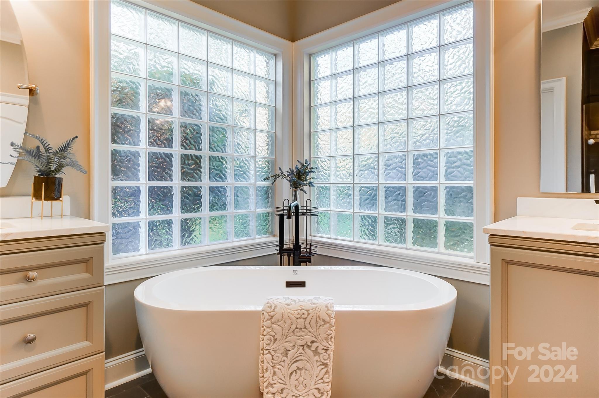 657 Portpatrick Place Fort Mill, SC 29708 - Photo 24 of 46 a white bath tub sitting next to a window