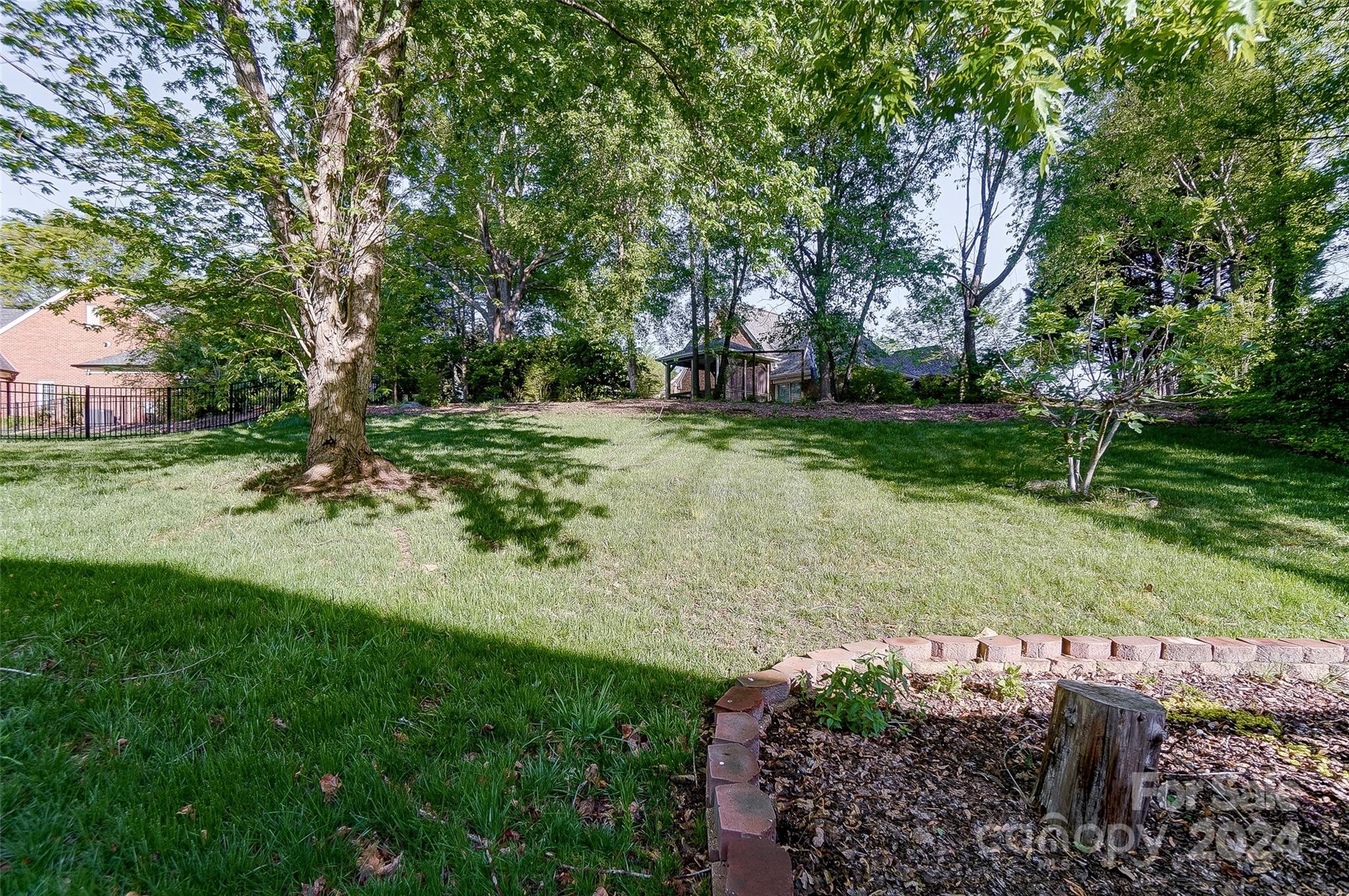 657 Portpatrick Place Fort Mill, SC 29708 - Photo 38 of 46 a huge green field with lots of trees