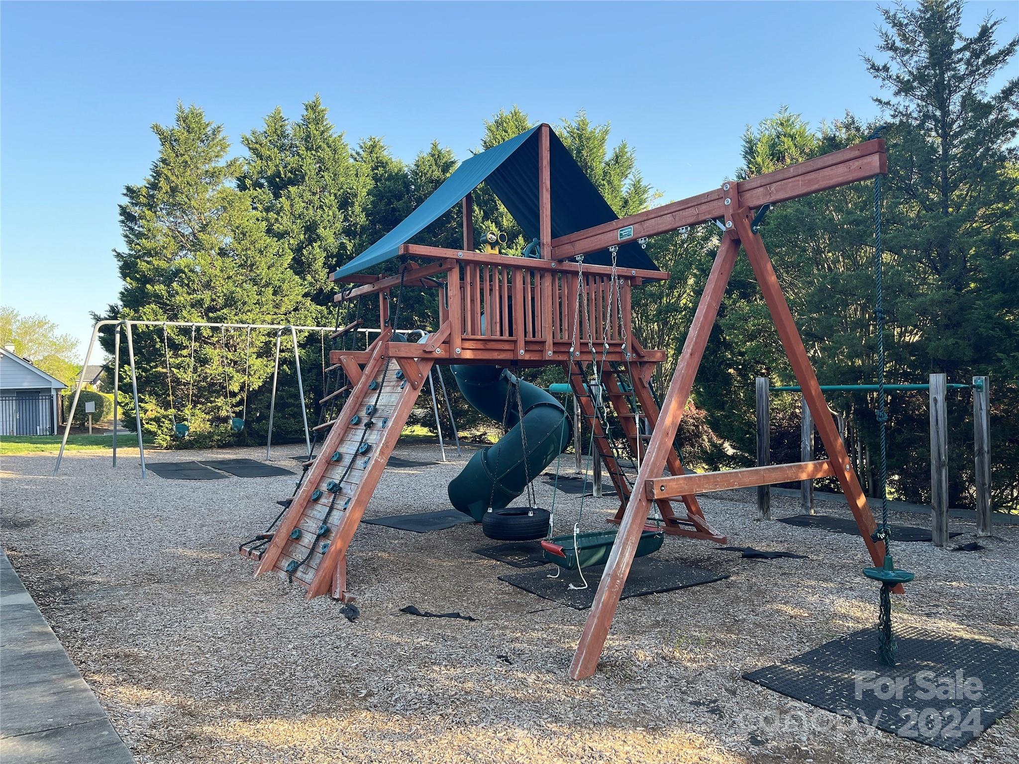 657 Portpatrick Place Fort Mill, SC 29708 - Photo 44 of 46 a view of wooden deck with a table and chairs